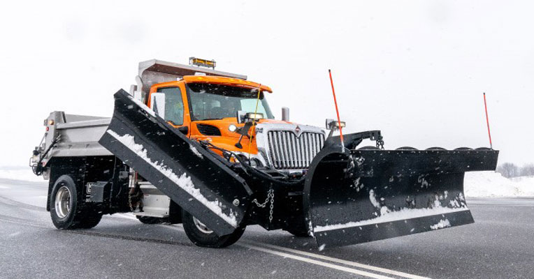 Monroe Truck with a Snow Plow
